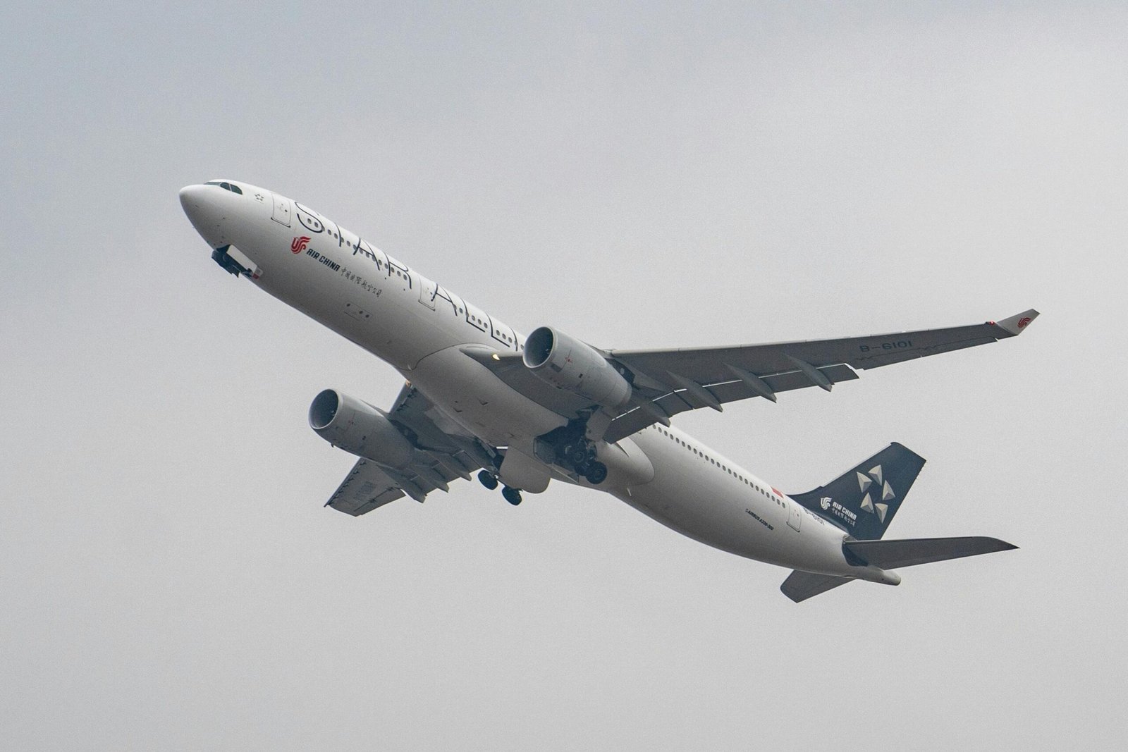 An Airbus A330 aircraft soaring into the sky during takeoff, displaying a sleek design.